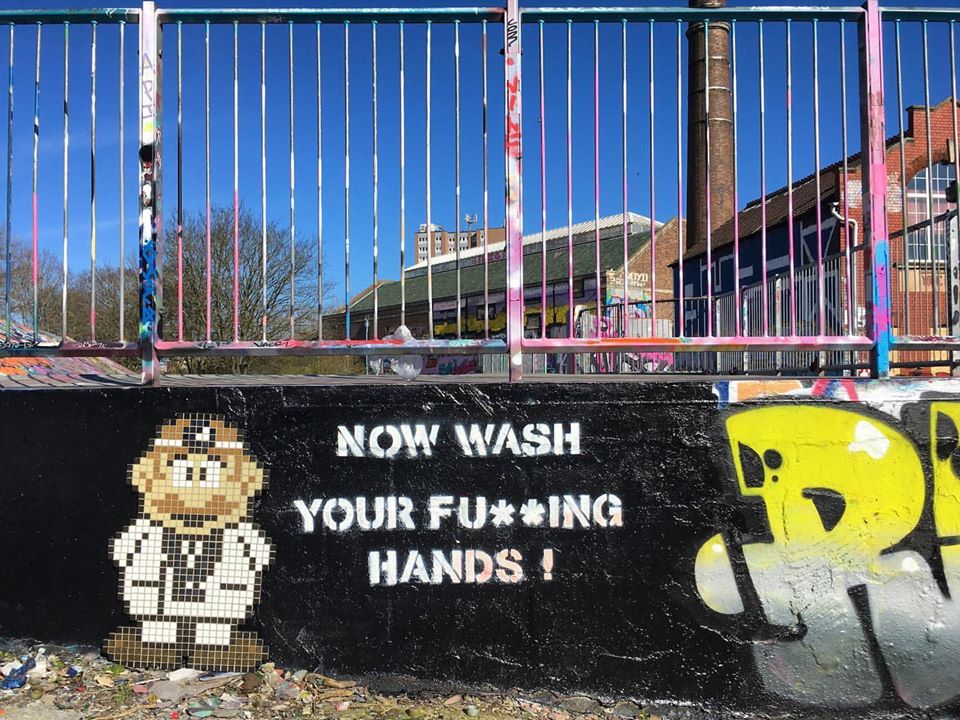 Coronavirus street art by Angus. Photo courtesy of the artist’s Facebook. Image